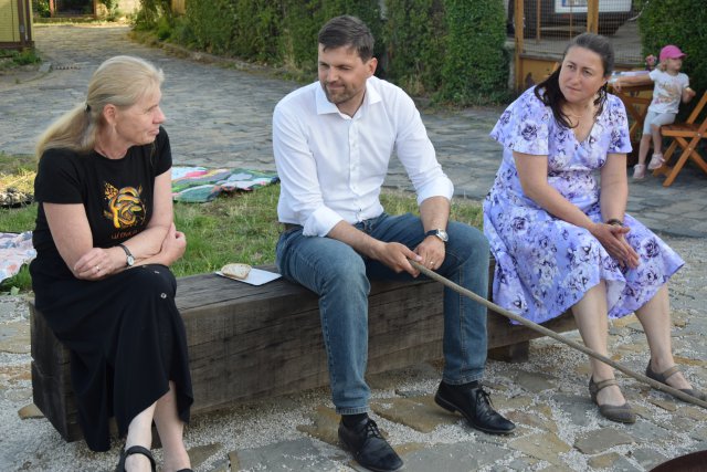 Three people sitting 