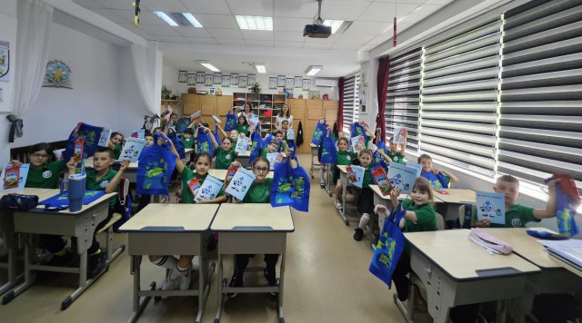 Children gathered in a classroom.