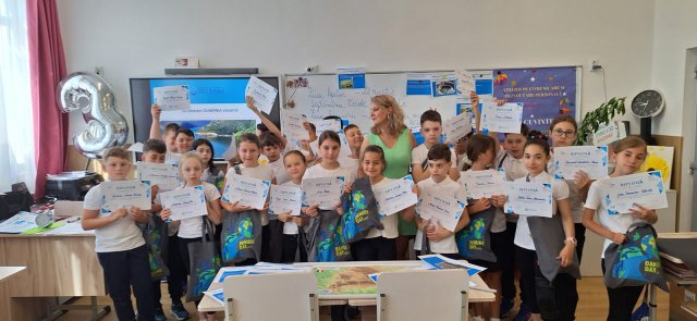 Children gathered in classroom. 