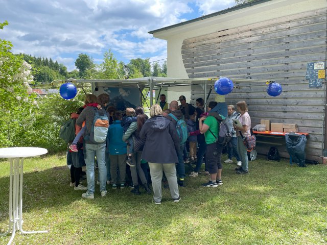 People standing outside for event